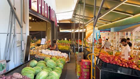 shoppers explore vibrant fruit market in inala plaza