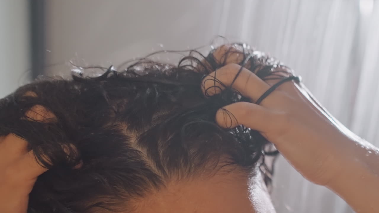 Scalp massage session. Steamy head massage for relaxation. Gentle finger pressure calms scalp and enhances blood flow. Relaxing shower massage focusing on roots and calming steam effects