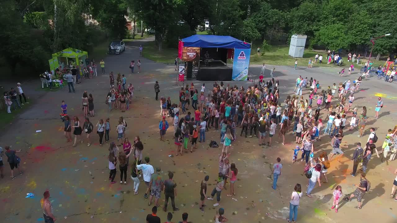 Happy People Celebrating Color Festival. VINNITSA, UKRAINE - JULY 2017: Happy young people celebrating during music and colors festival