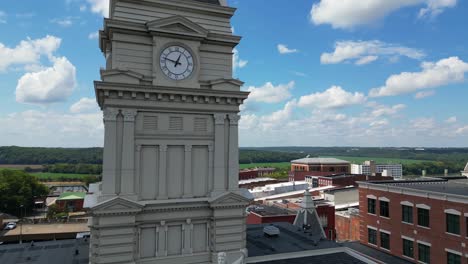 rising quarter orbit of statue atop courthouse located in downtown clarksville tennessee