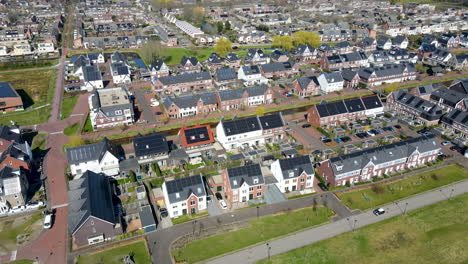 jib-up-of-houses-in-town-with-solar-panels-on-rooftop