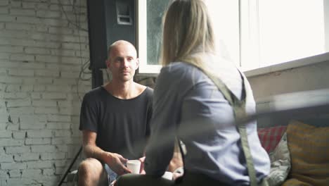 man woman friends talking