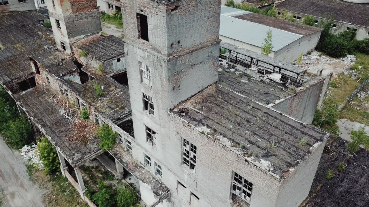 Abandoned industrial building. Ruins of an old factory. Aerial view