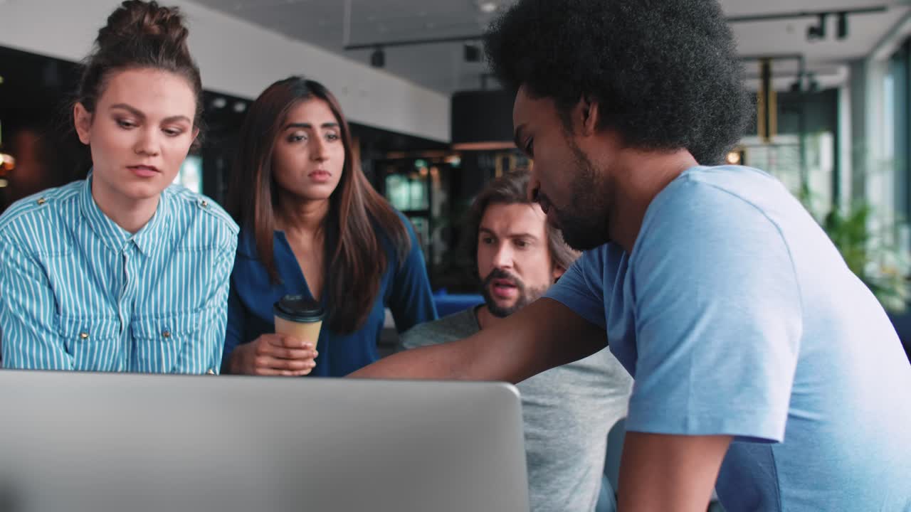 Young coworkers sharing ideas together