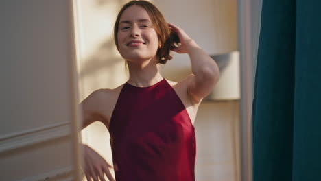 woman reflection touching hair getting ready for date closeup. happy girl jump