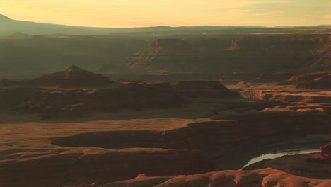 long shot of the colorado river snaking through canyonlands national park from the dead horse point overlook