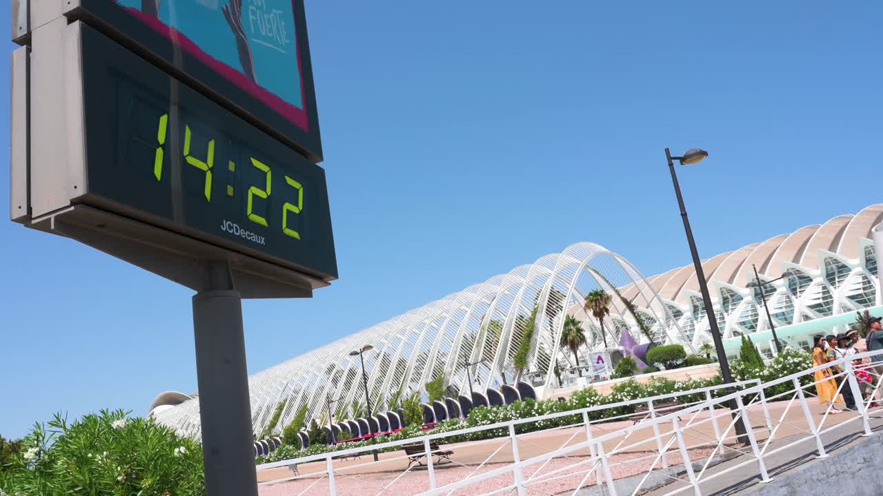 A digital thermometer displays a temperature of 39 degrees Celsius (39°C) outside the City of Arts and Sciences complex during the summer and tourist season in Valencia, Spain.