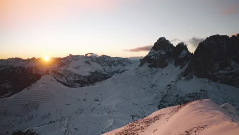 Golden-sunset-over-a-snow-covered-Passo-Sella