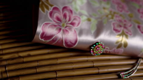 traditional korean hanbok displayed on bamboo bench