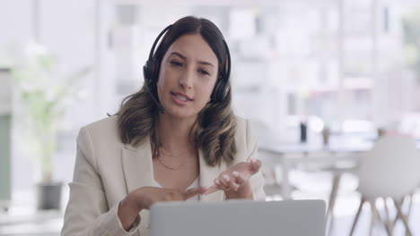 Young-female-call-center-agent-talking-to-clients