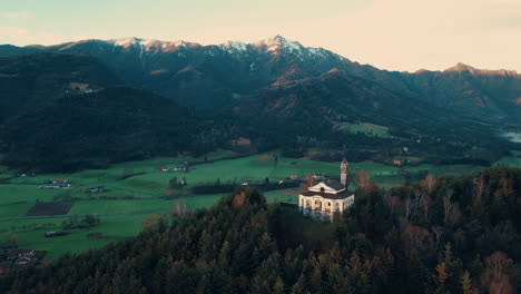 aerial footage of small city between italian alps