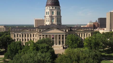 kansas state capitol building in topeka, kansas with close up drone video moving up