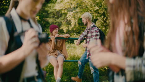 young tourists friends exploring forest at vacation