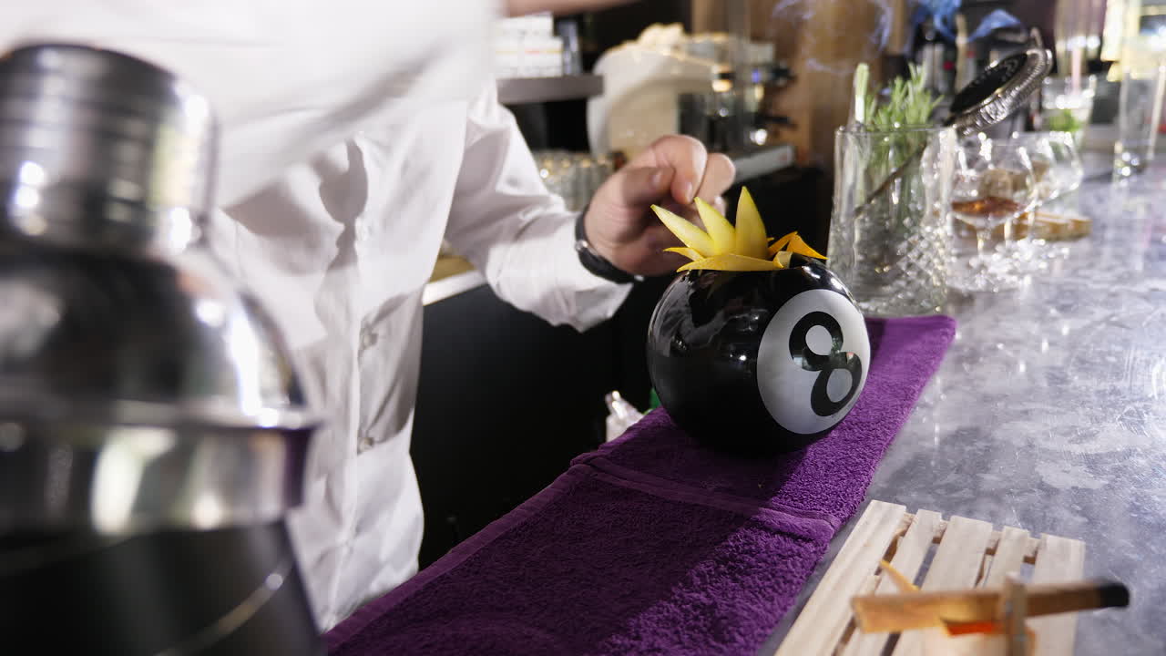 Cocktail preparation at a bar