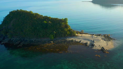 aerial view of a serene tropical island with a sandy beach and clear waters