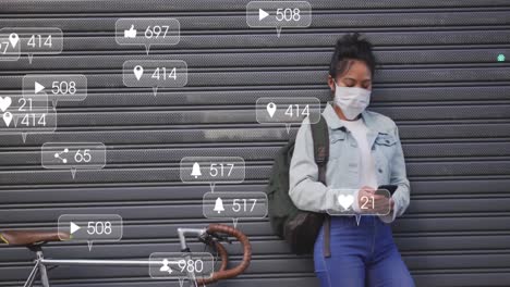 animación de iconos de redes sociales y números en pancartas sobre una mujer con máscara facial usando un teléfono inteligente