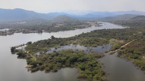 scenic aerial views with a river and forests in thailand