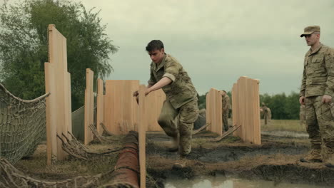 soldier on an outdoor military obstacle course