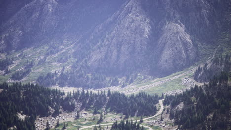 hiking through rugged mountain terrain on a clear sunny day