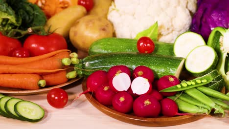 assorted vegetables displayed on a black background