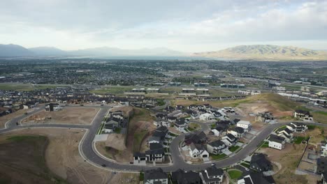 aerial parallax above traverse mountain home subdivision and new builds, lehi utah