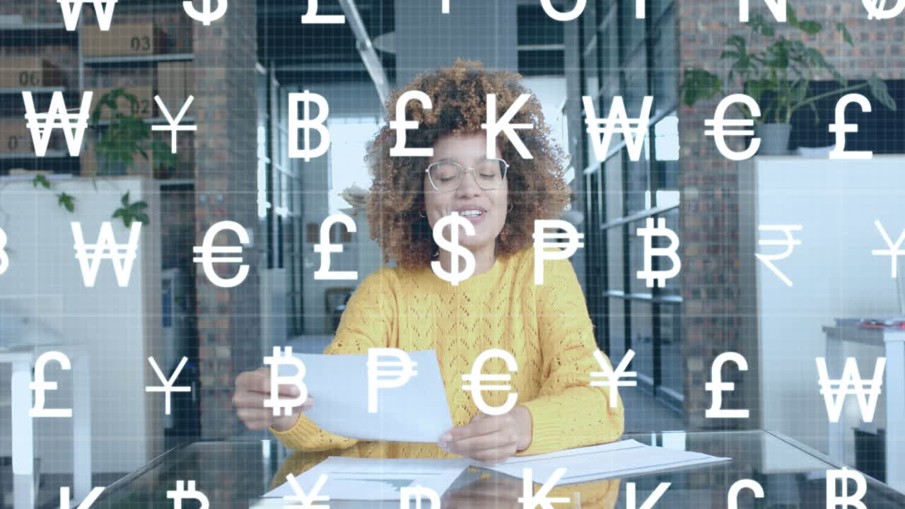 White currency symbols scrolling over happy biracial casual businesswoman having video call