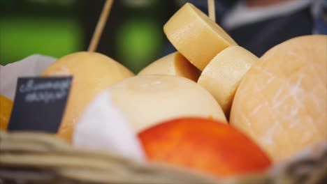 assortment of cheeses in a basket