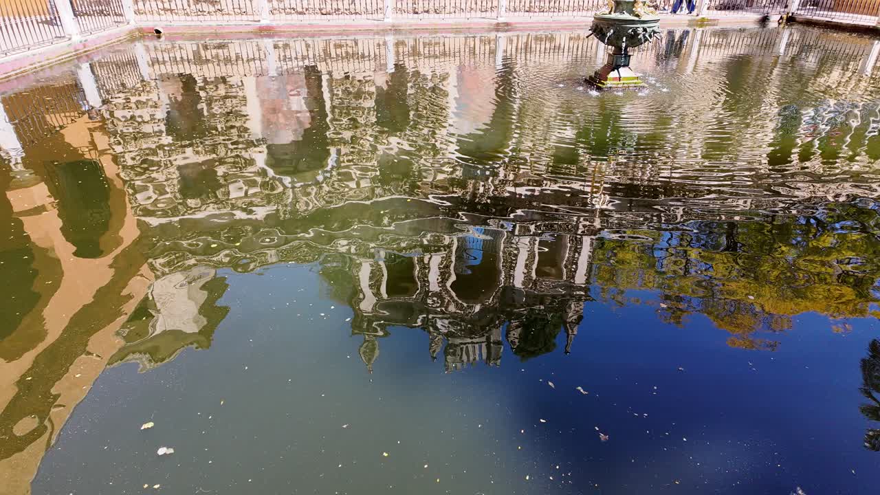 Mercury's Pool Is A Large And Reflective Fish Pond In The Idyllic Gardens Of The Royal Palace Of Seville, Spain, Europe.
