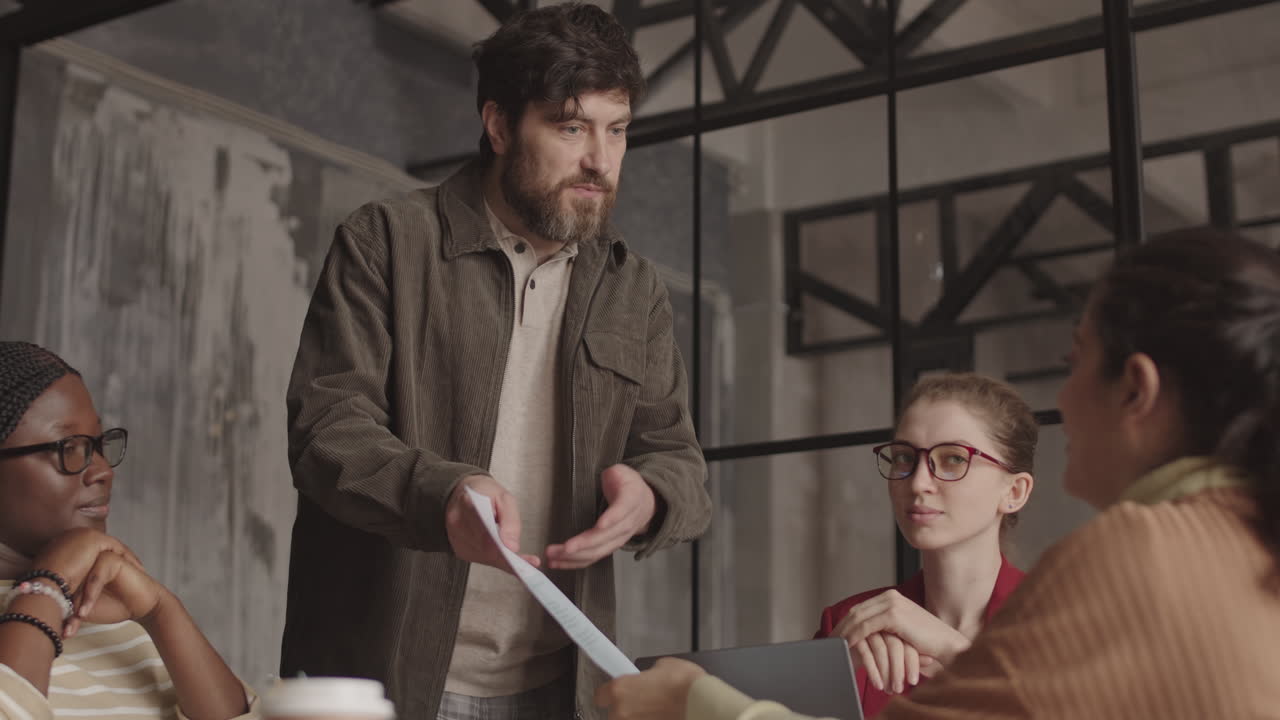 Caucasian Office Worker Speaking at Conference