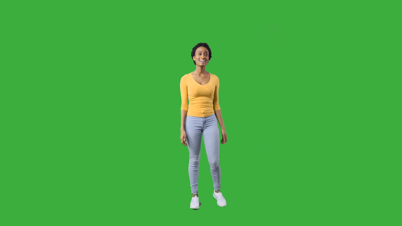 Woman looking around against green screen