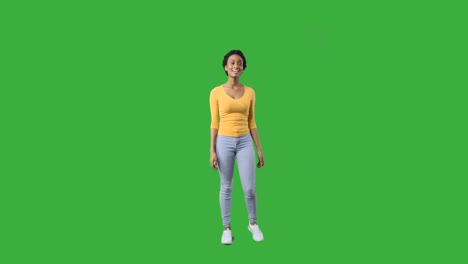 woman looking around against green screen
