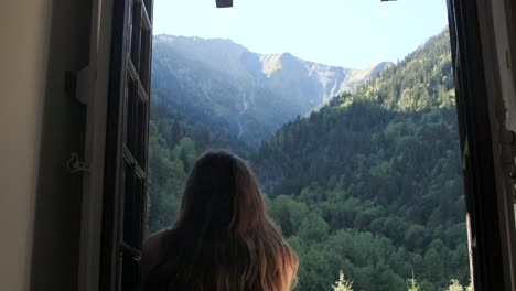 stunning shot of an attractive young woman taking in the beautiful forest scenery in france