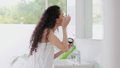 Woman,-bathroom-and-mirror-with-cream