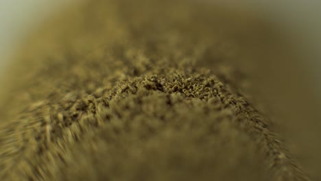 moringa powder macro with light sweep dramatic shadow close-up isolated fresh green organic