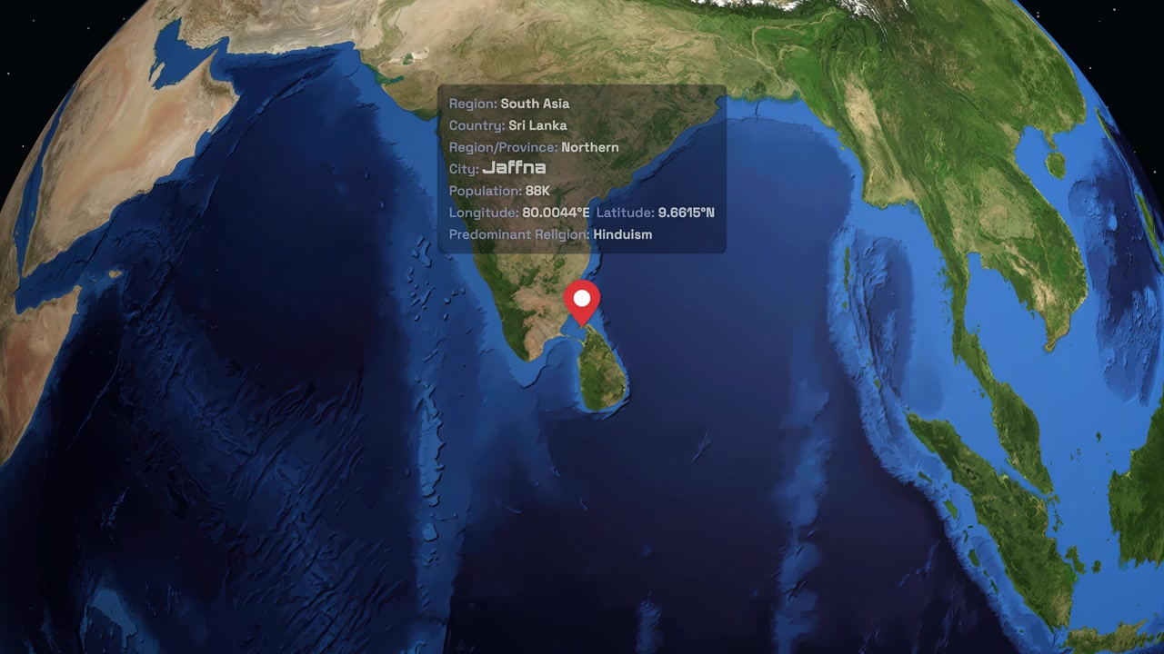 Digital globe rotates and zooms into Jaffna, Sri Lanka, displaying regional geographic data points