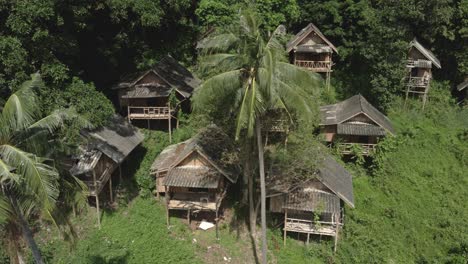 aerial trucking, run down empty thai bungalows pandemic travel restrictions