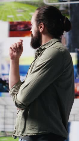 vertical video determined guy admires social media visuals and user interface elements