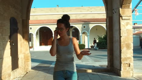 tourist woman speaking on mobile phone. summer vacation on cyprus