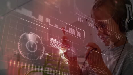 wearing headphones, child interacting with animation on futuristic digital interface