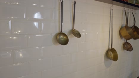 vintage kitchen decor with hanging pots and pans