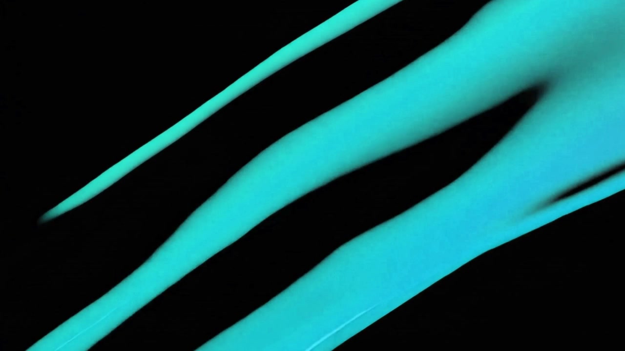 Abstrakt flydende maling i levende røde og cyan farver
