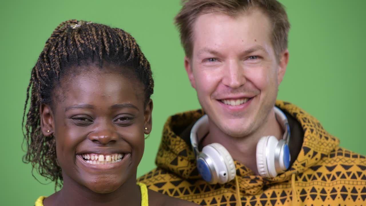 Young multi-ethnic couple smiling together