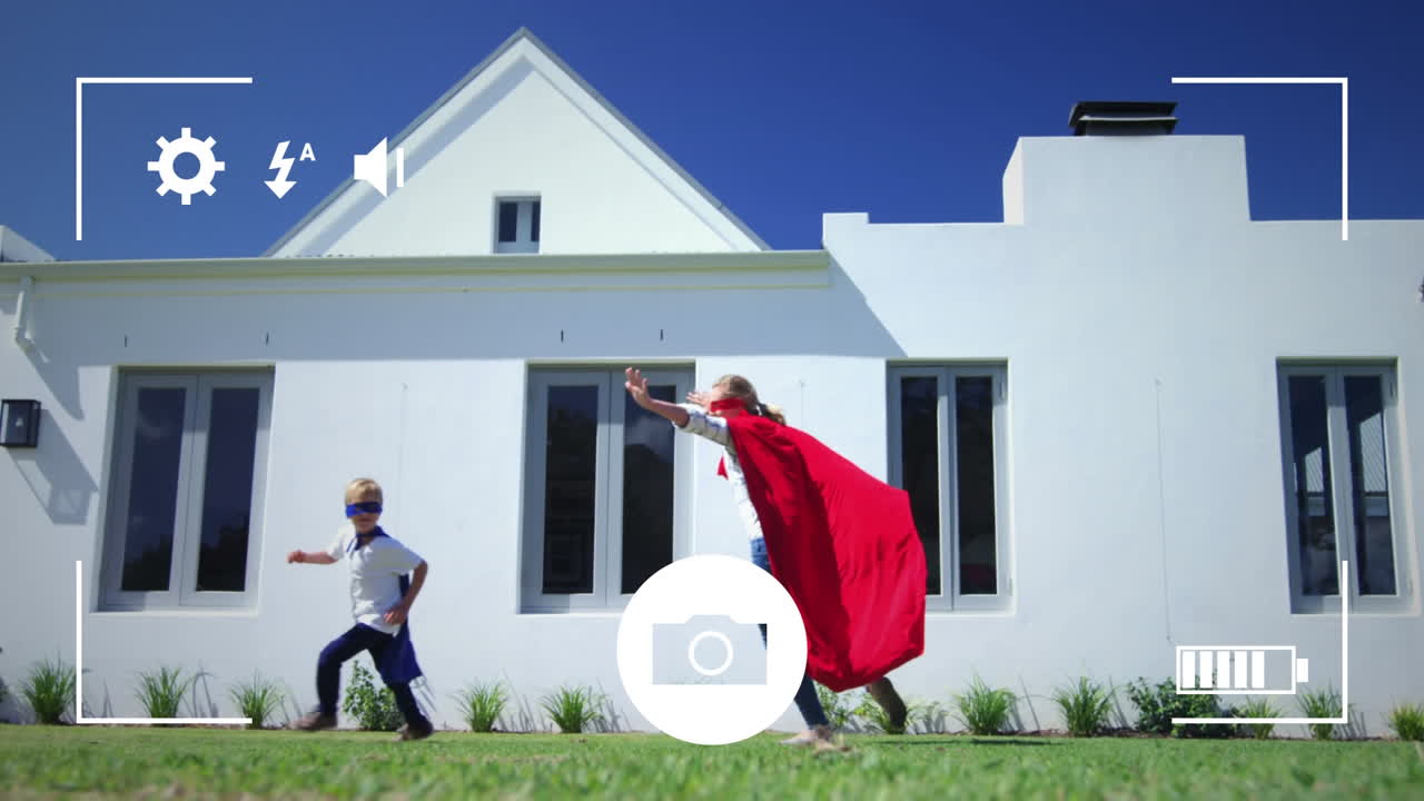 tomando fotos de madre e hijo en el jardín con una cámara digital