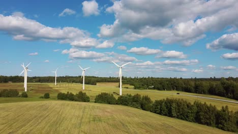 aerial view of wind farm or wind park, with high wind turbines for generation electricity