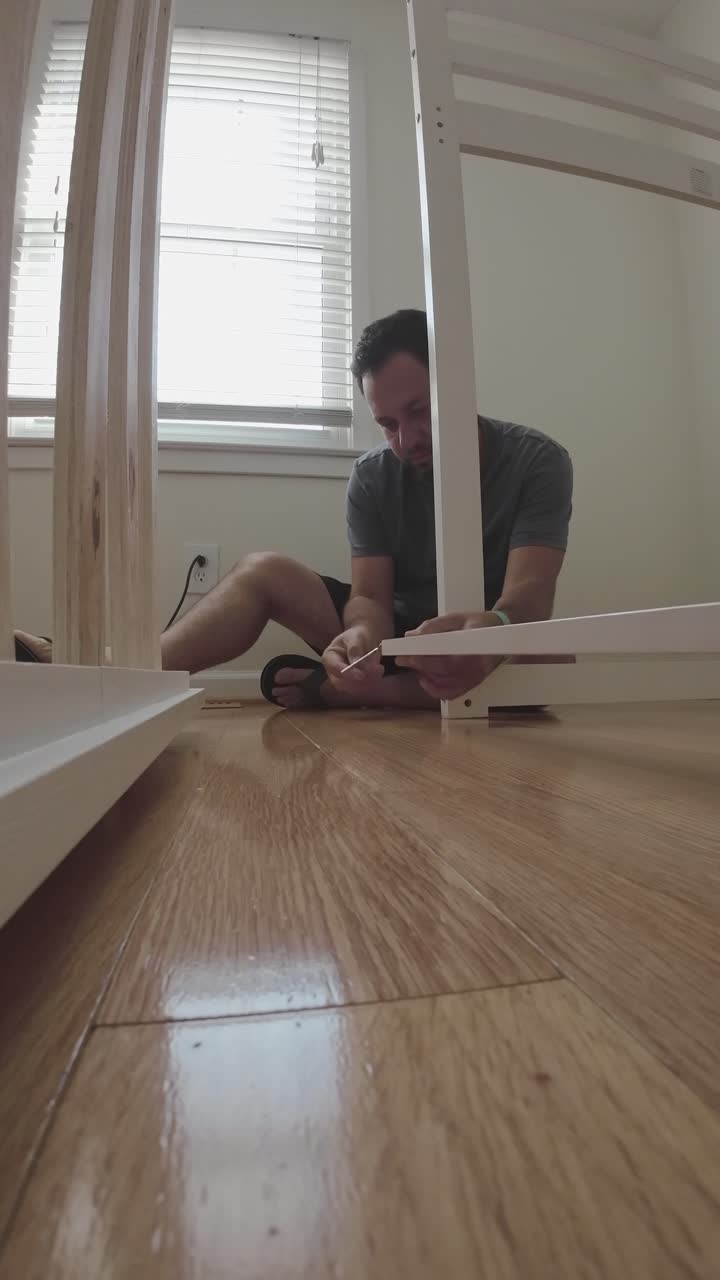 Man assembling furniture