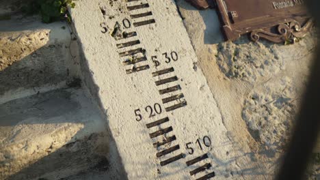 Spate-level-numerals-for-Loire-Valley-river,-unique-in-their-design-printed-onto-stairs