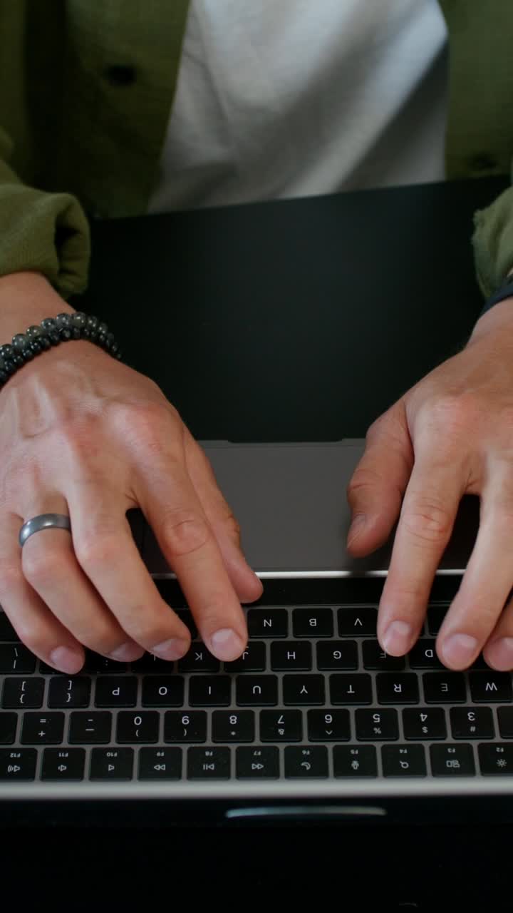 Person typing on a laptop