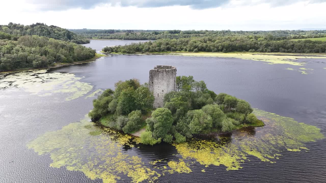 Cloughoughter Castle on small island in lake. Irish historical landmark, aerial. Co. Cavan