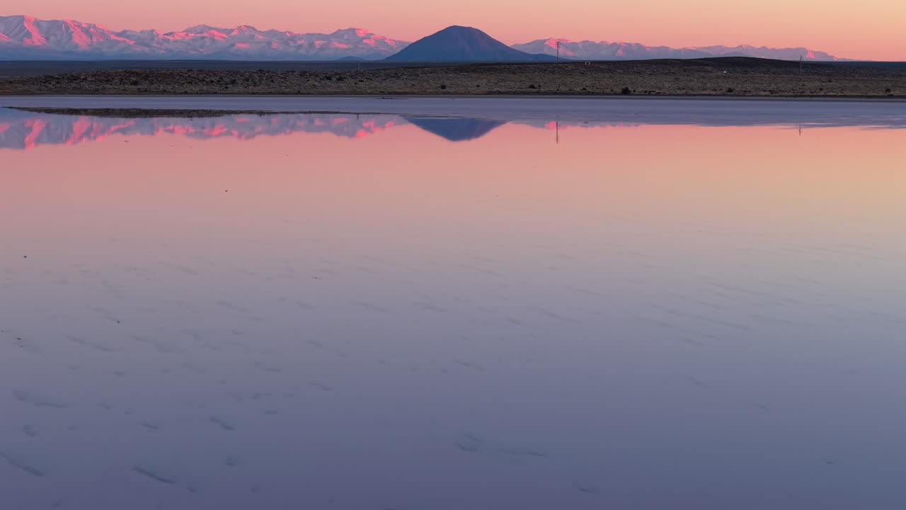 Aerial view of Peaceful Andean sunset in Diamante salt flats, Mendoza, Argentina