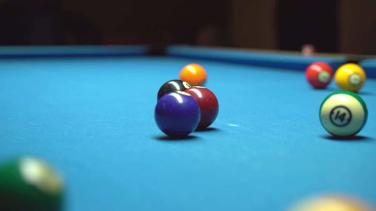 Billiard, kick off. Closeup. Blue table, rolling balls